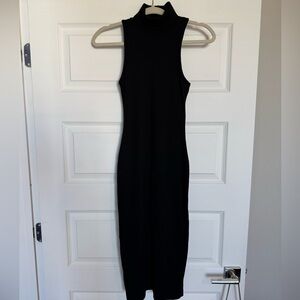 Black sleeveless dress.